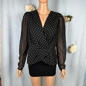 Express NWTs dot print faux front peplum top.